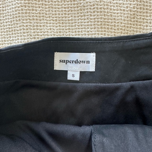 Superdown REVOLVE Asymmetrical Black Button-Front Mini Skirt - Picture 5 of 7